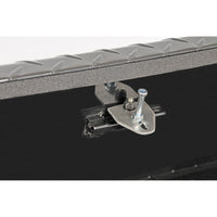 Interior hardware detail of the DeeZee 111 gallon aluminum transfer tank toolbox combo (DZ92656B) showing self-adjusting striker and reinforced components for durability and lid alignment.