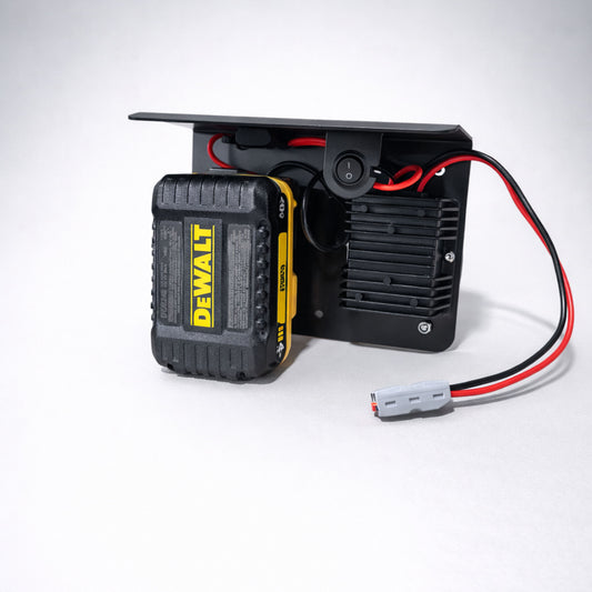 Top view of PowerMate Converter (SKU PMC1001) with yellow DeWalt 20V battery adapter installed and wiring visible