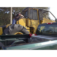 RDS 90 gallon aluminum transfer fuel tank toolbox combo (RDS71788) installed in a truck bed fueling heavy equipment, demonstrating real-world use for job sites, agriculture, and mobile fueling applications.