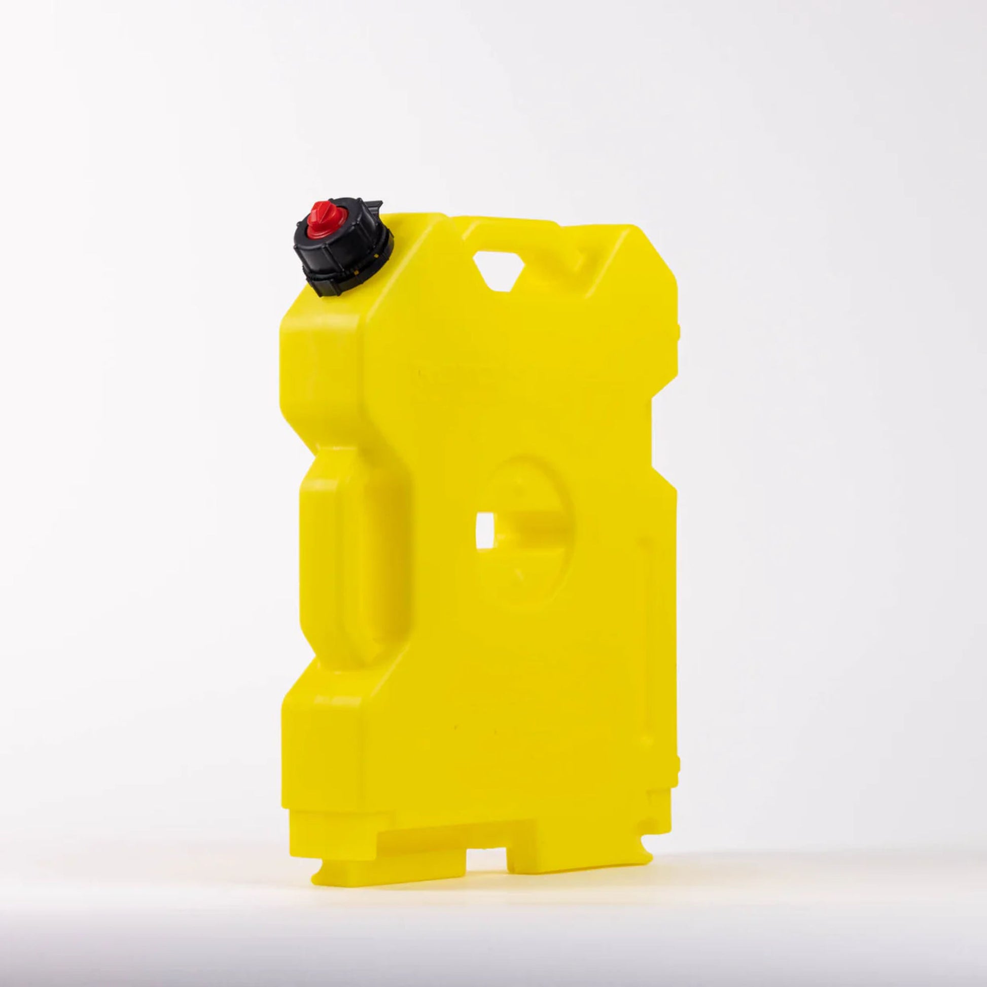 Angled view of a yellow RotoPax 2 gallon diesel fuel container highlighting thick walls and compact rectangular shape