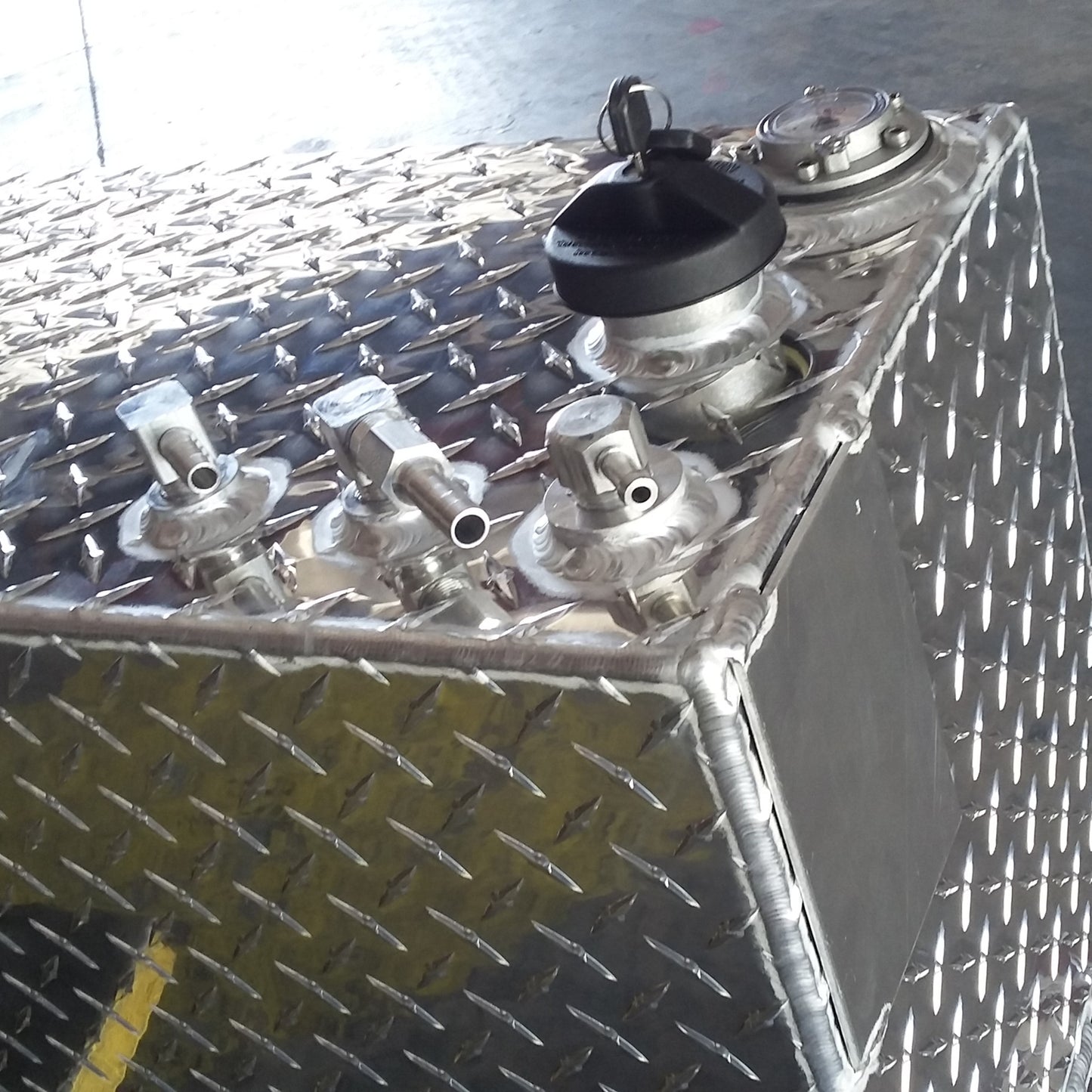 ATI AUX65CBRG 62 gallon combo gasoline fuel tank with toolbox SKU AUX65CBRG top view with lockable filler cap, vent, and fuel pickup return fittings