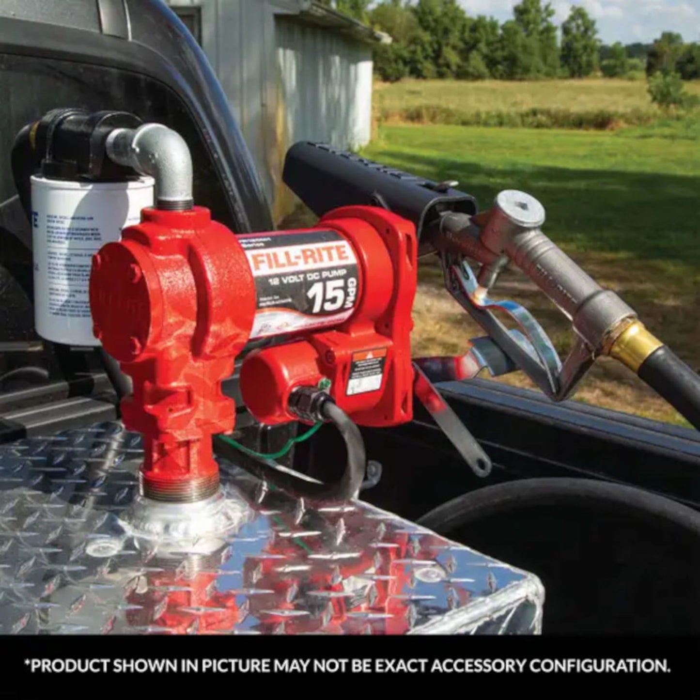 Fill-Rite FR1210H 12V DC 15 GPM fuel transfer pump mounted on mobile transfer tank in truck bed, ready for fueling equipment in field conditions