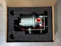 FlowTek FT-4070P electric fuel pump securely packaged in a custom-cut foam insert inside the product box for safe shipping.