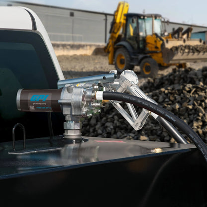 GPI M-150S-MU 12V fuel transfer pump SKU M150S-MU in use dispensing fuel on construction site with manual nozzle