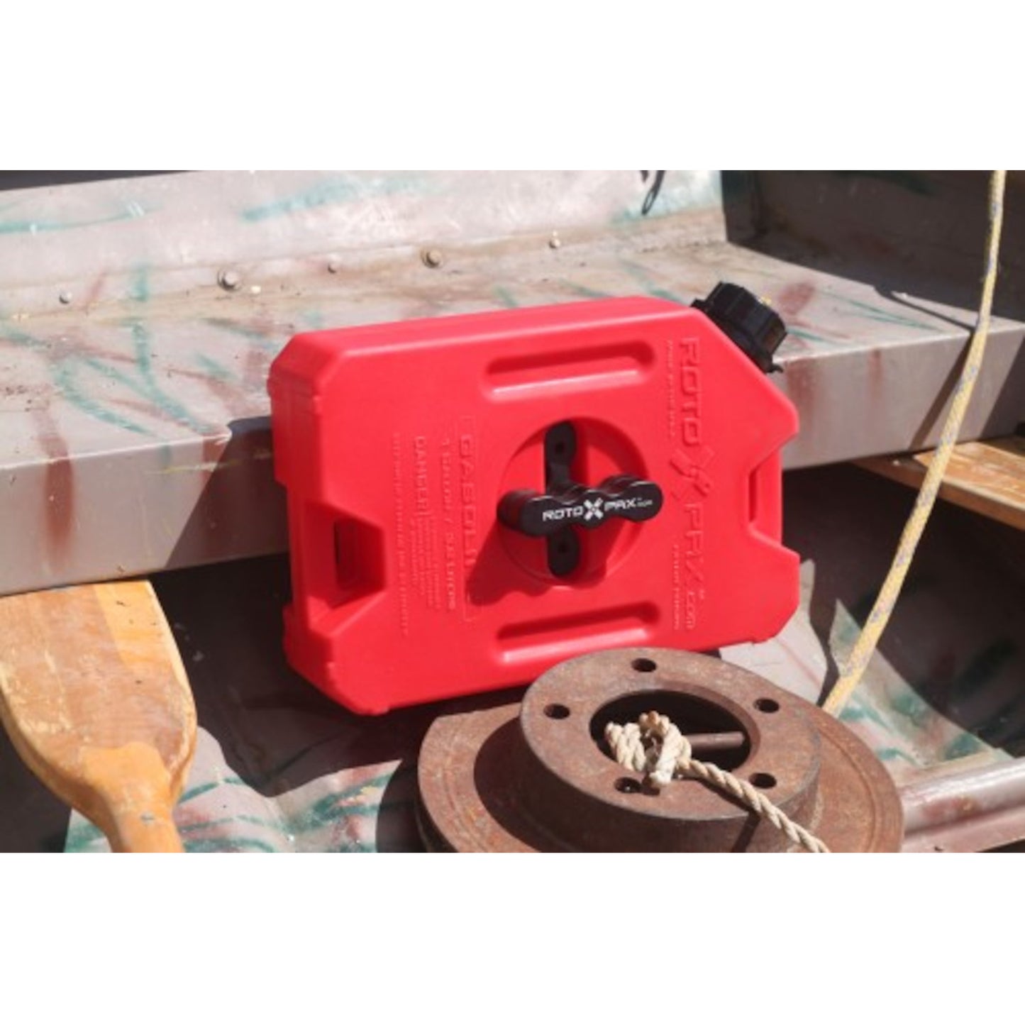 RotoPax 1 gallon gasoline fuel container mounted with locking pack mount