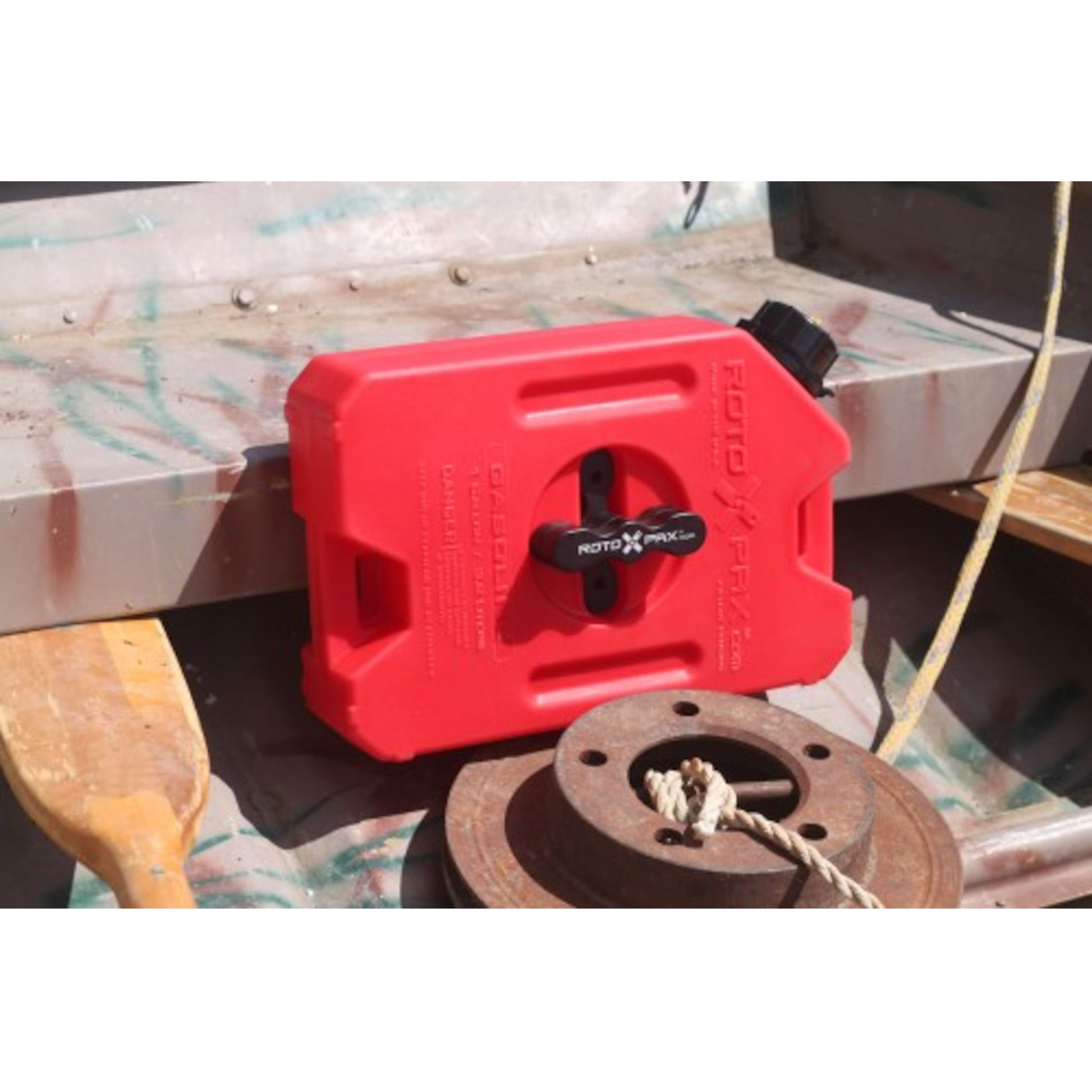 RotoPax 1 gallon gasoline fuel container mounted with locking pack mount