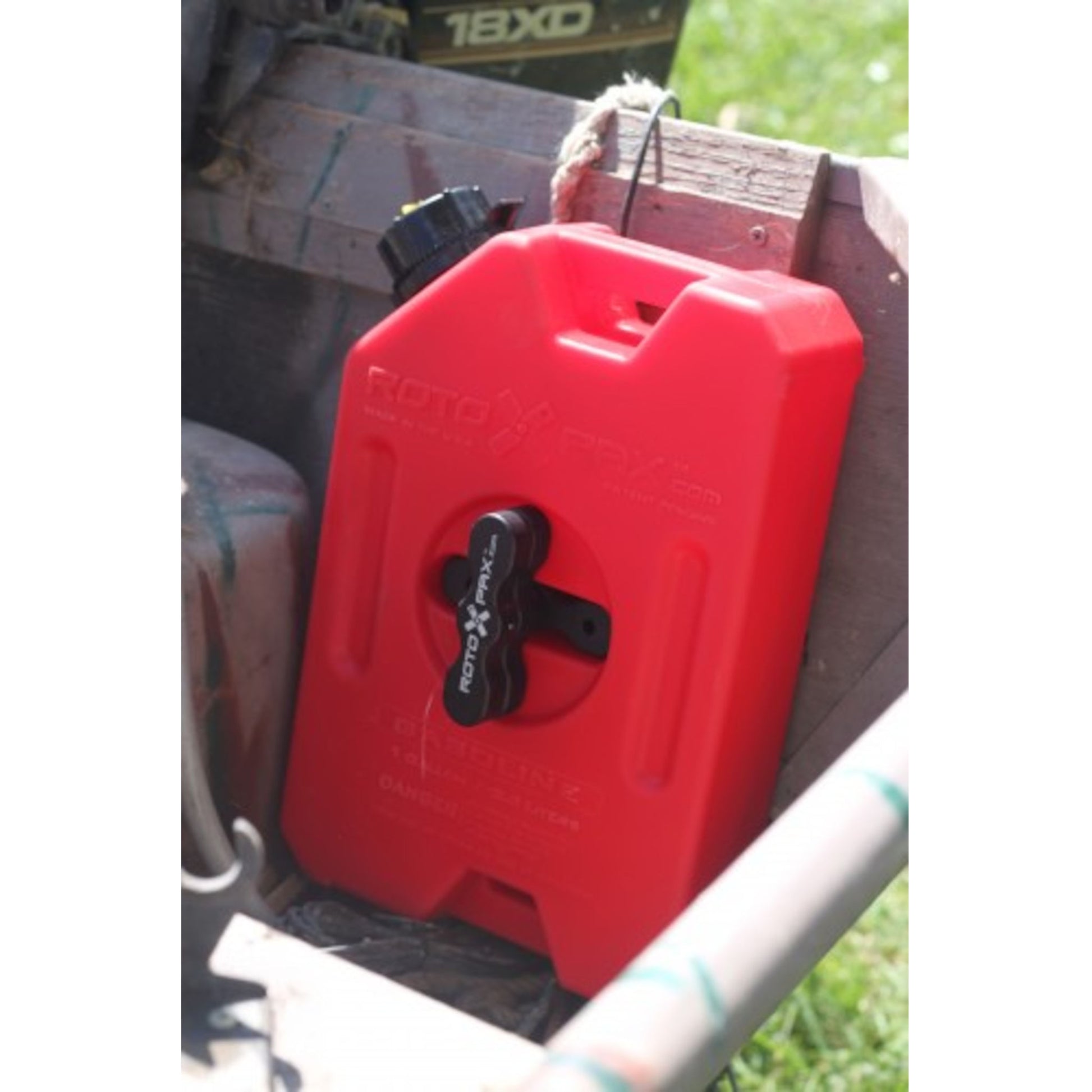 RotoPax 1 gallon gasoline fuel container mounted for outdoor utility use