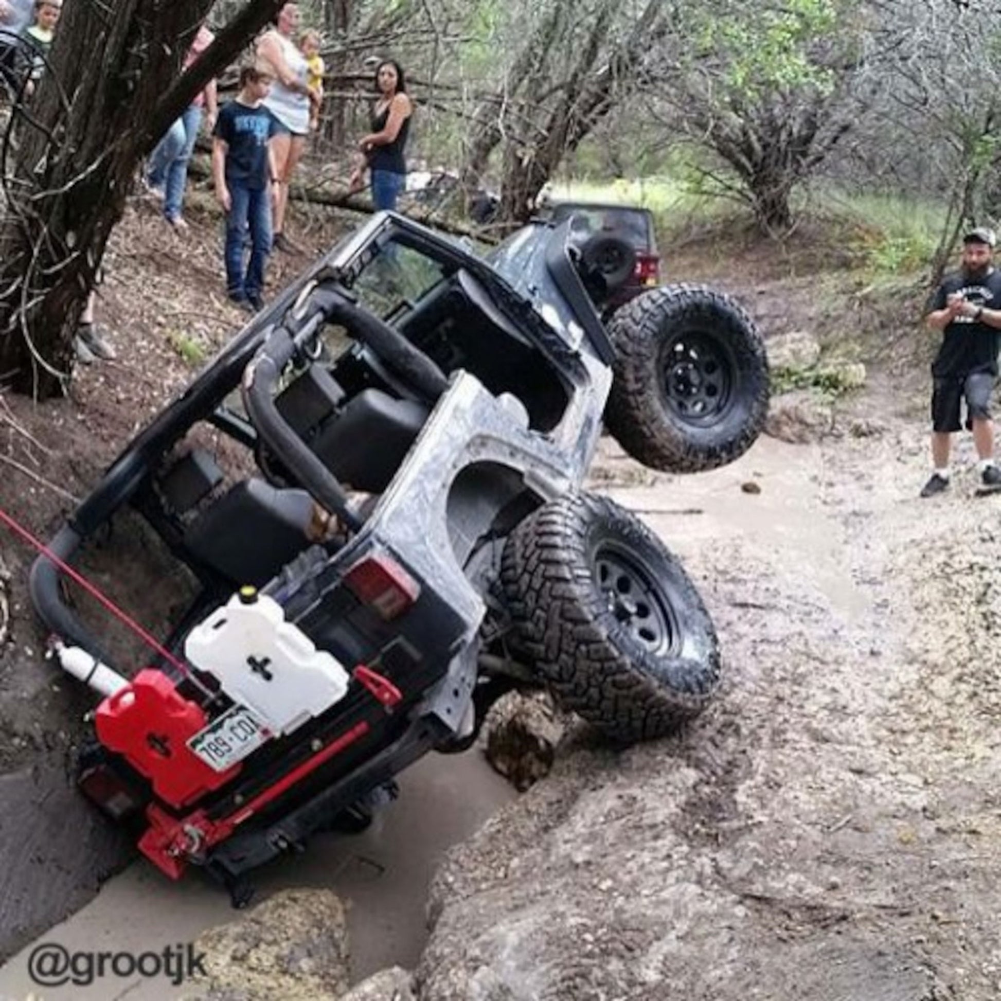 RotoPax locking pack mount securing fuel container during off-road recovery